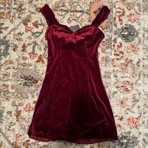 Le Lis Off-Shoulder Velvet Mini Dress in Deep Wine